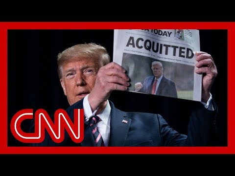 Trump waves 'acquitted' headline, takes shot at Mitt Romney in speech