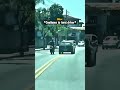 Dumb Biker Kicks Car In Road Rage