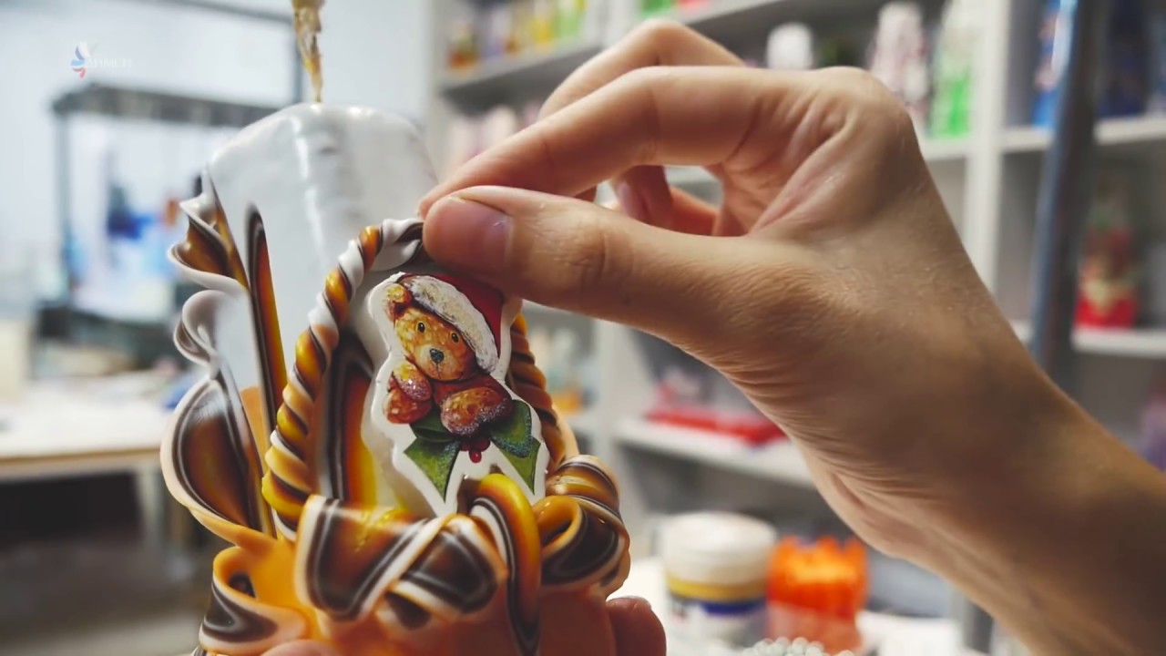 A carved candle with New Year's Bear. Master Class business insider