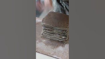Lifting a layered nerikomi clay block, to prepare for making ceramic bowls #shorts