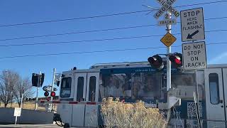RTD Light Rail, Fitzsimons station parking lot Railroad Crossing, Aurora, Colorado 