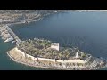D-Log M. Kusadasi, Turkey. Aerial view of the stone causeway leading to Pigeon Island. Summer mor...