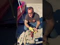 Cutting up a clean Corvette in the driveway ￼