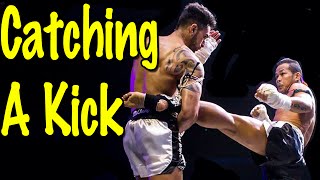 Muay Thai Defense Technique: Catch Body Kick and Counter