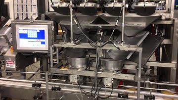 Actionpac Weighing and Filling Snack Foods with Denester and Clamshell Indexer Conveyor Systems