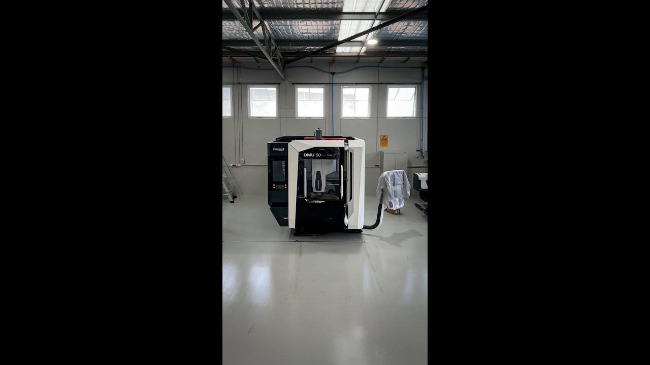 Getting our DMG MORI DMU-50 into position.