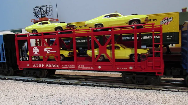 Grand Trunk Western SD38 diesel slowly pulls an O scale freight train. Clear video image.