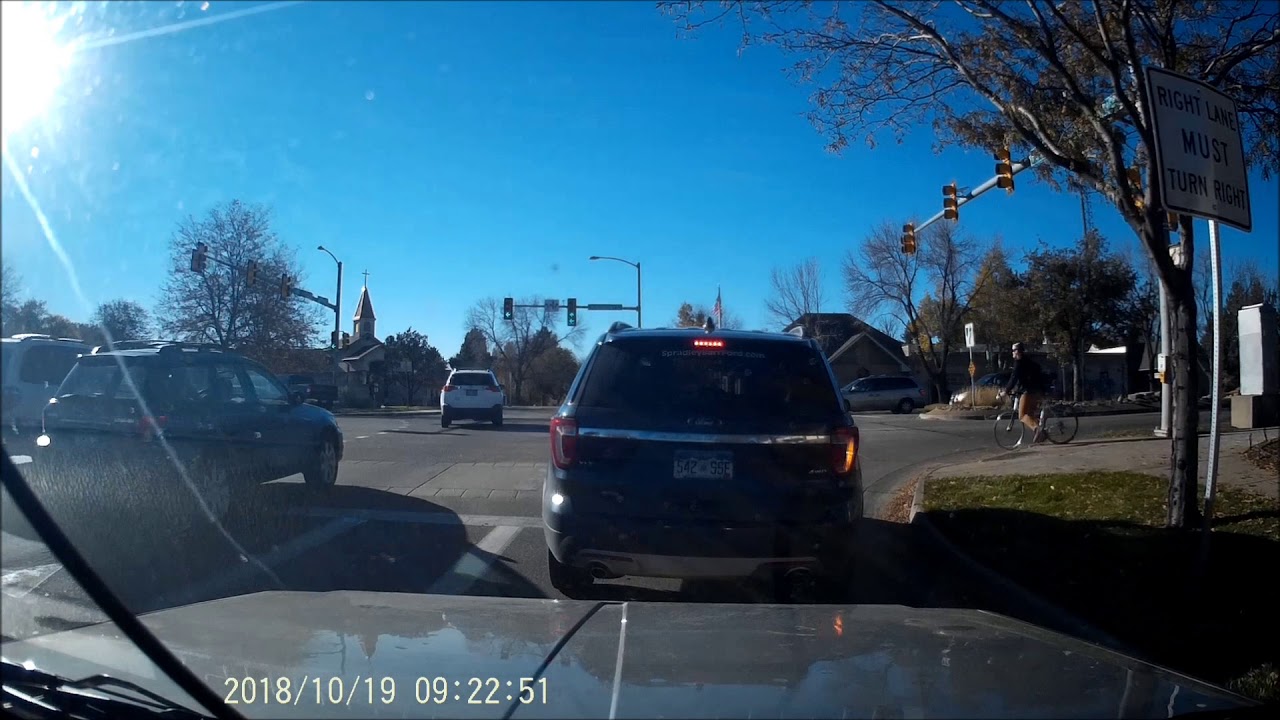 Red light runner crashes into left turning traffic - YouTube