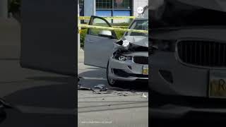 Motorcycle hangs from traffic light after crash