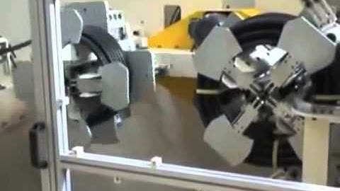 Automatic hose/pipe Coiling & Strapping Machine