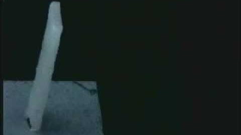 Self-standing of a micropart using liquid surface tension