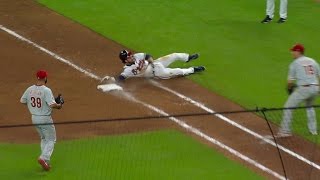 PHI@ATL: Swanson slides into first for wacky single