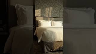 Ultra realistic luxury bedroom interior, soft warm lighting, king size bed, modern wall #shorts