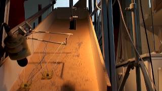 Singing Sands in the Lab