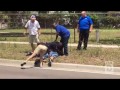 Raw: Bystanders help officer being attacked