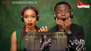 OUR FIRST TIME HEARING WONDERLAND INDONESIA by Alffy Rev (ft. Novia Bachmid) REACTION!!!😱