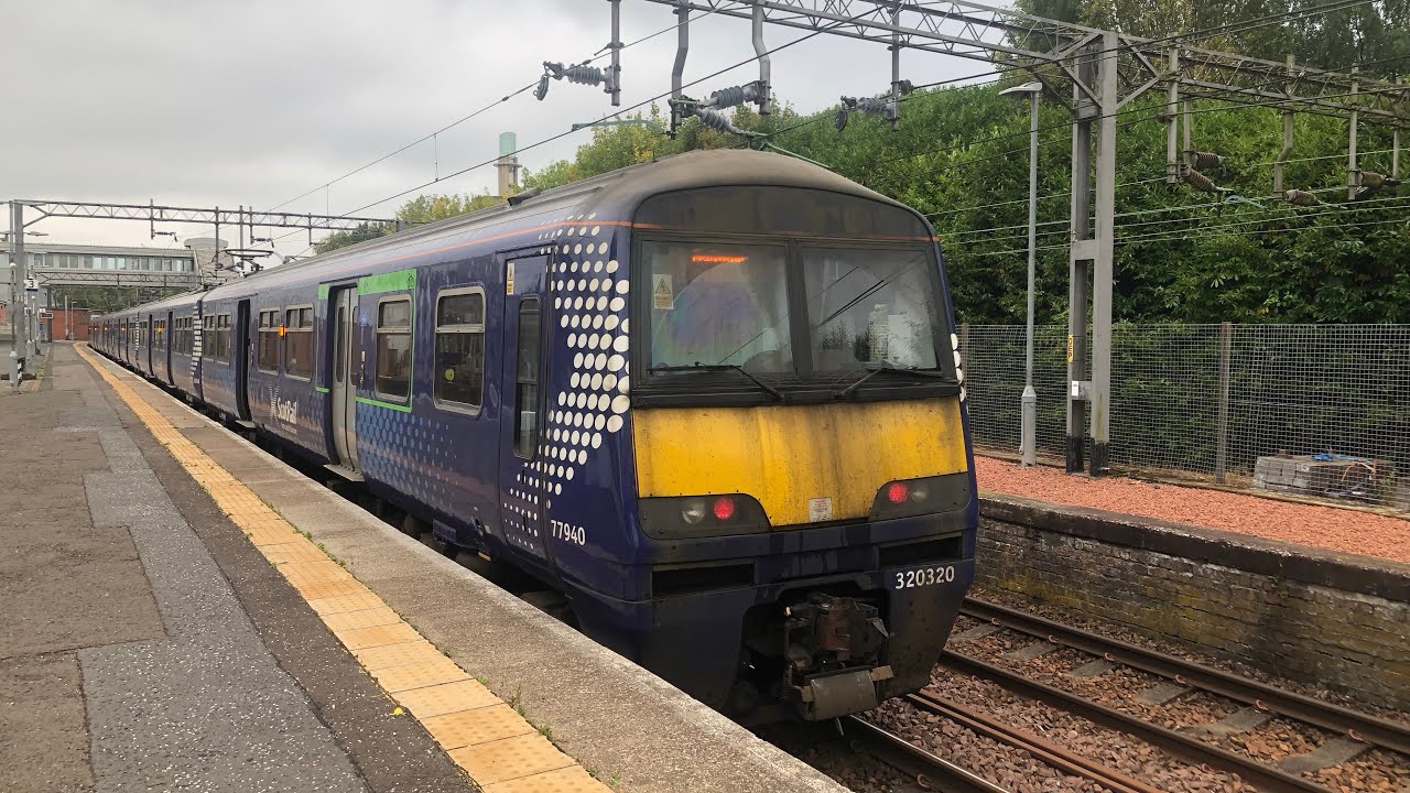 2F25 320411+320320 Cumbernauld-Dalmuir passing mossend down yard