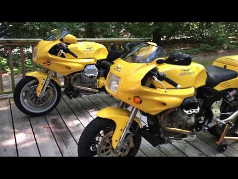 Two yellow 1997 Moto Guzzi 1100 Sport's with Staintune exhaust systems.