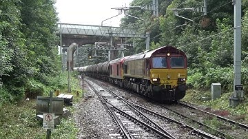 DB Schenker 66089 and 60011 passing Reading West