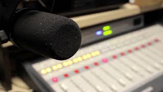 Radio Broadcasting Mic and Mixer Desk  - Copyright Free Stock Footage Clip