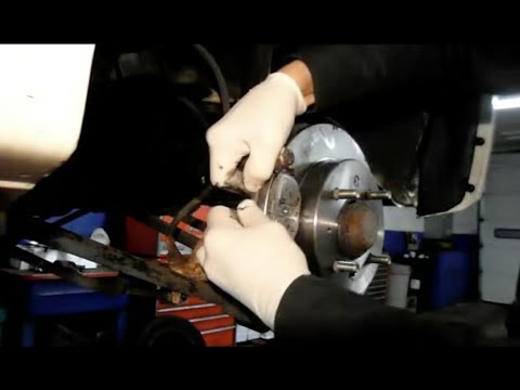 How To Replace Rear Brakes 2006 Kia Spectra