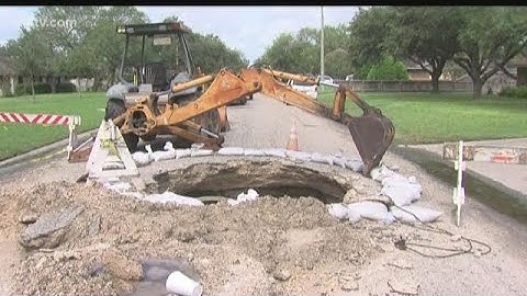 Bishop crews work to repair massive sinkhole