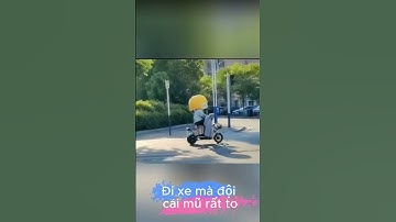 Đi xe mà đội cái mũ rất to