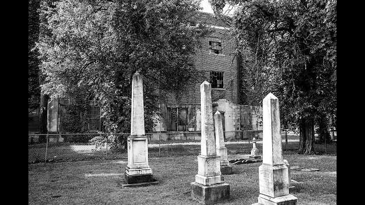 Abandoned Clarksdale High School with a Cemetery o...
