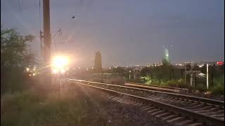 KZ4at пассажирским поездом