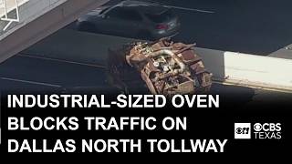 Large debris blocks southbound Dallas North Tollway near LBJ, slowing traffic