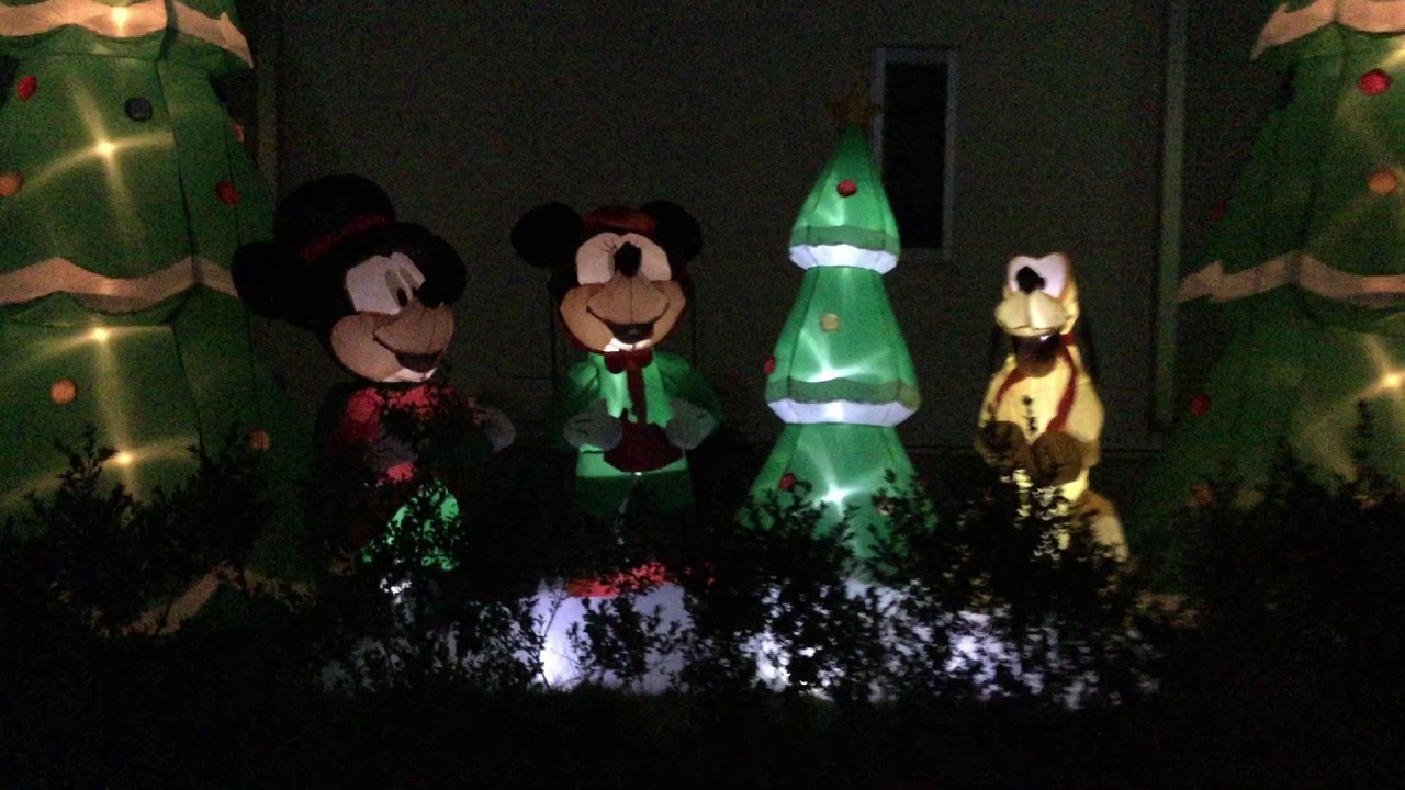 Mickey Minnie and Pluto Christmas Caroloers inflatable with music scene
