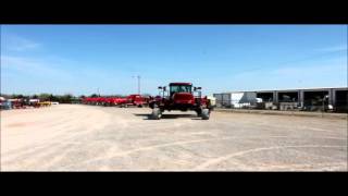 2011 MacDon M205 self-propelled windrower for sale | sold at auction April 29, 2015