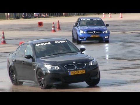 LOUD Mercedes C63 AMG And BMW M5 E60 Playing On A Wet Airfield!!