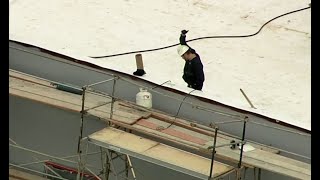 Raw Video: Suspect In Fremont Home Invasion On Roof Of Building Under Construction