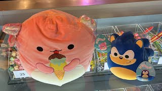 Playing Rick and Morty coin pusher at xscape for Archie and Sonic squishmallow