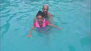 Little Girl Enjoying Water With Pottwal Swim Vest