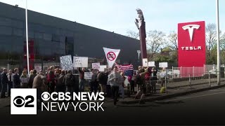 Protesters speak out against Elon Musk at Tesla dealerships across U.S., Europe