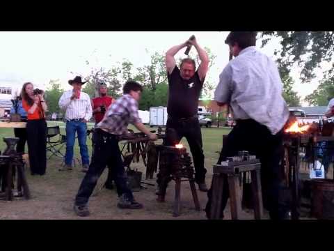 Three strikers making a bottom tool