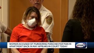 Woman charged with murder in Manchester stabbing arraigned