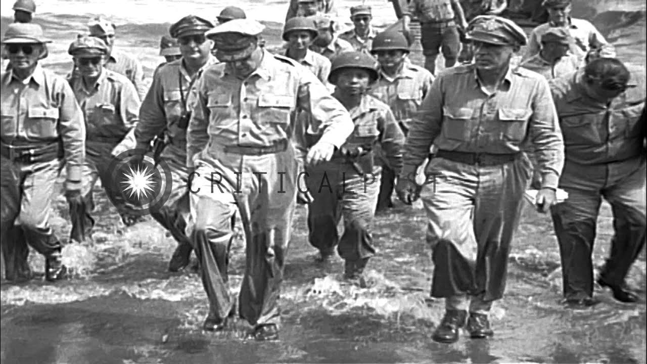 Us general macarthur commanding the assault on leyte in world war ii