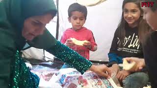 "Living the Nomadic Life: The Ashayari Family in Their Traditional Tent