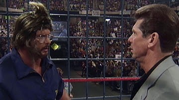 "Stone Cold" Steve Austin disguises himself as a cameraman to launch a sneak attack on Mr. McMahon