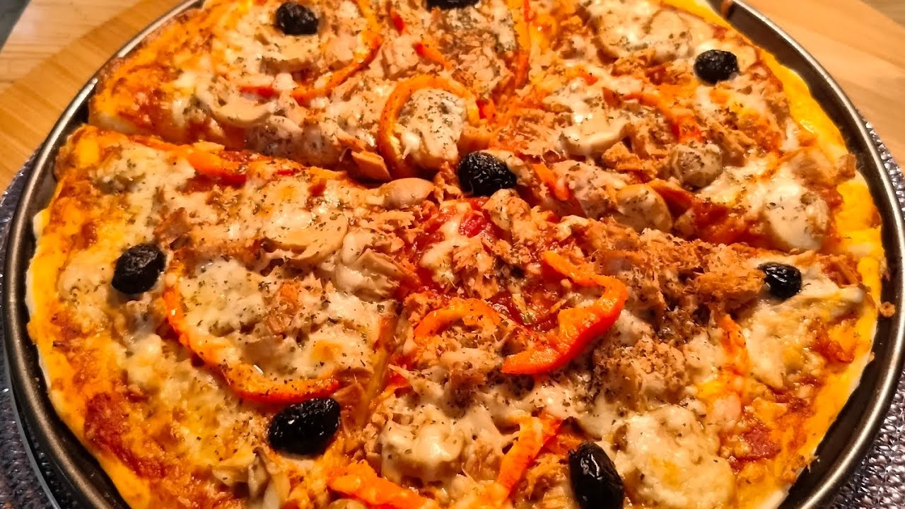 Pizza légumes et thon, poivron,champignons fromage 