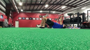 Core engaged slide-board hip lift 2-1 hamstring curl