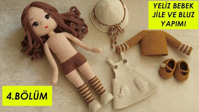 Poupée au crochet. Comment donner l'expression au visage et broder