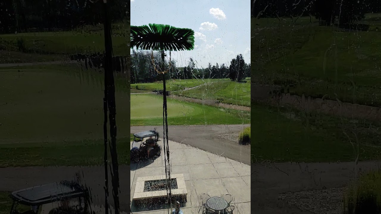 safely cleaning High windows with our revolutionary water fed pole system that dries clean and clear