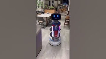 The delivery robot works in a coffee shop