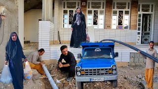 Moving a large pipe and a busy day in the village with the help of Abbas and his father