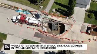 Weeks after water main break, sinkhole expands in SW Calgary neighbourhood