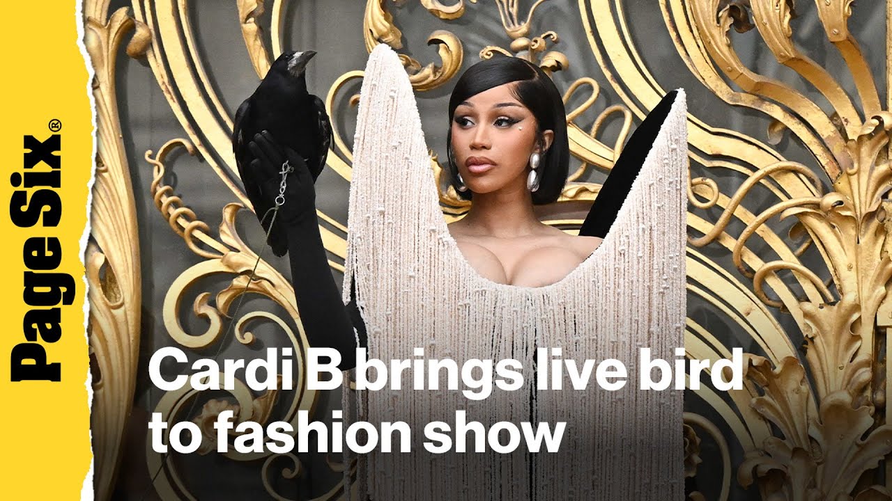 Cardi B brings the drama with live crow and miles of fringe at Schiaparelli show in Paris